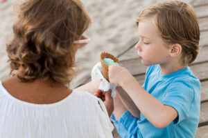 Parent meeting a child on the beach after filling C79 Form correctly.