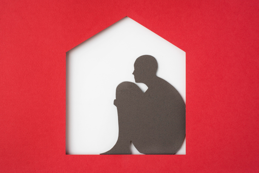 Symbol of abused person - image of human being trapped in closed house. With a help of McKenzie Friend this can be fixed.